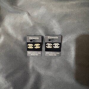 NWT ZIREONIA CC coco chanel stud earrings 2 pair - one gold toned/ other silver